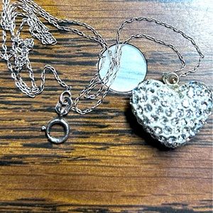 Sterling silver heart necklace.